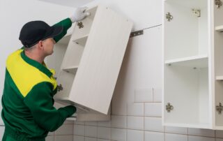 hire a cabinet painter or a handyman